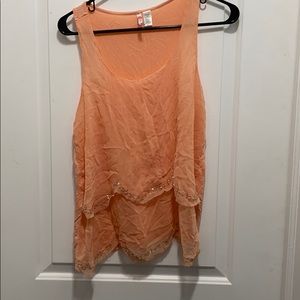 Peach tank top with scallop edge and bead details
